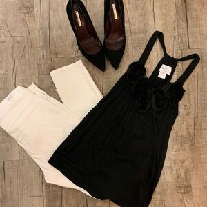 Women's black dressy top with flower‎ neckline